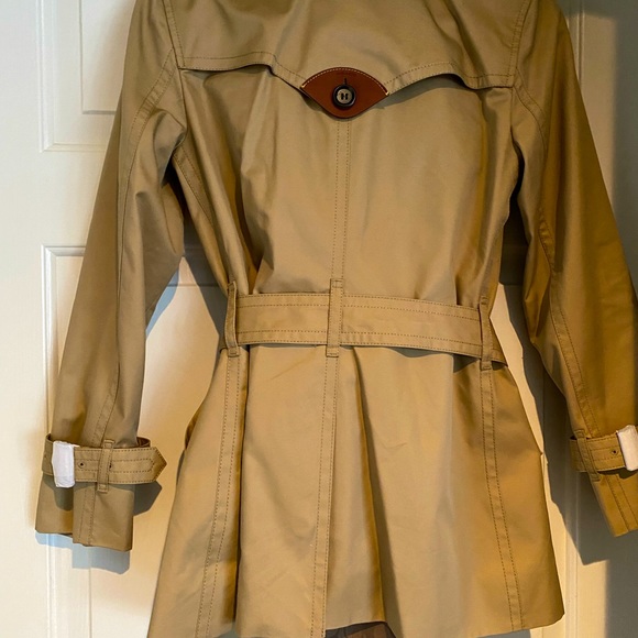 Coach Jackets & Blazers - COACH—standard trench coat. New w/tags. Neutral/tan color. Size: x-small